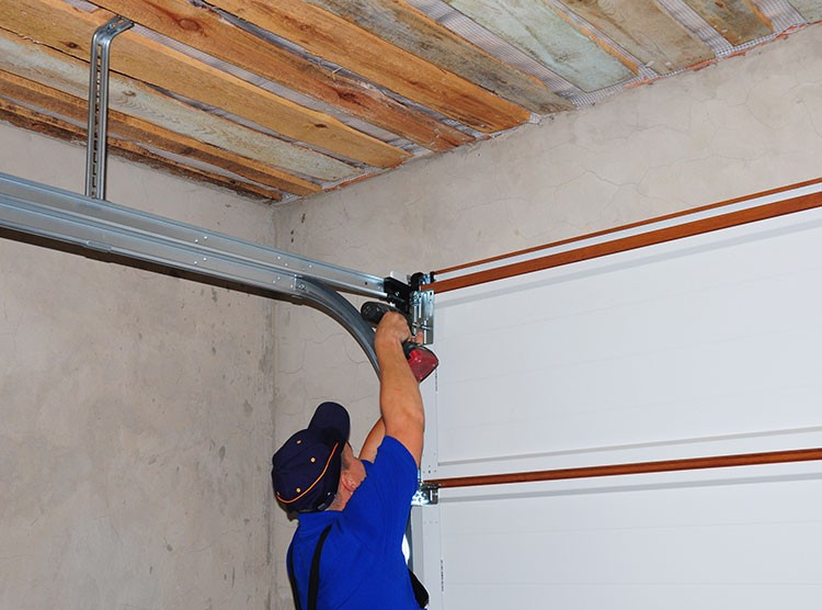 How To Fix A Noisy Garage Door Garage Doors Garage Door Design Garage Door Maintenance